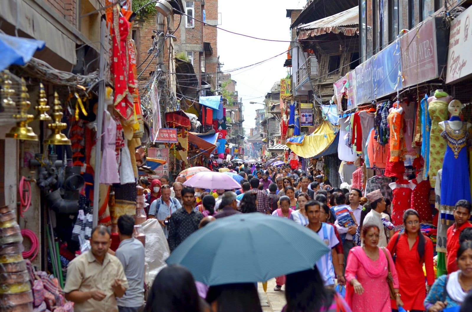 Busy bazaar street lined with shops in Kathmandu